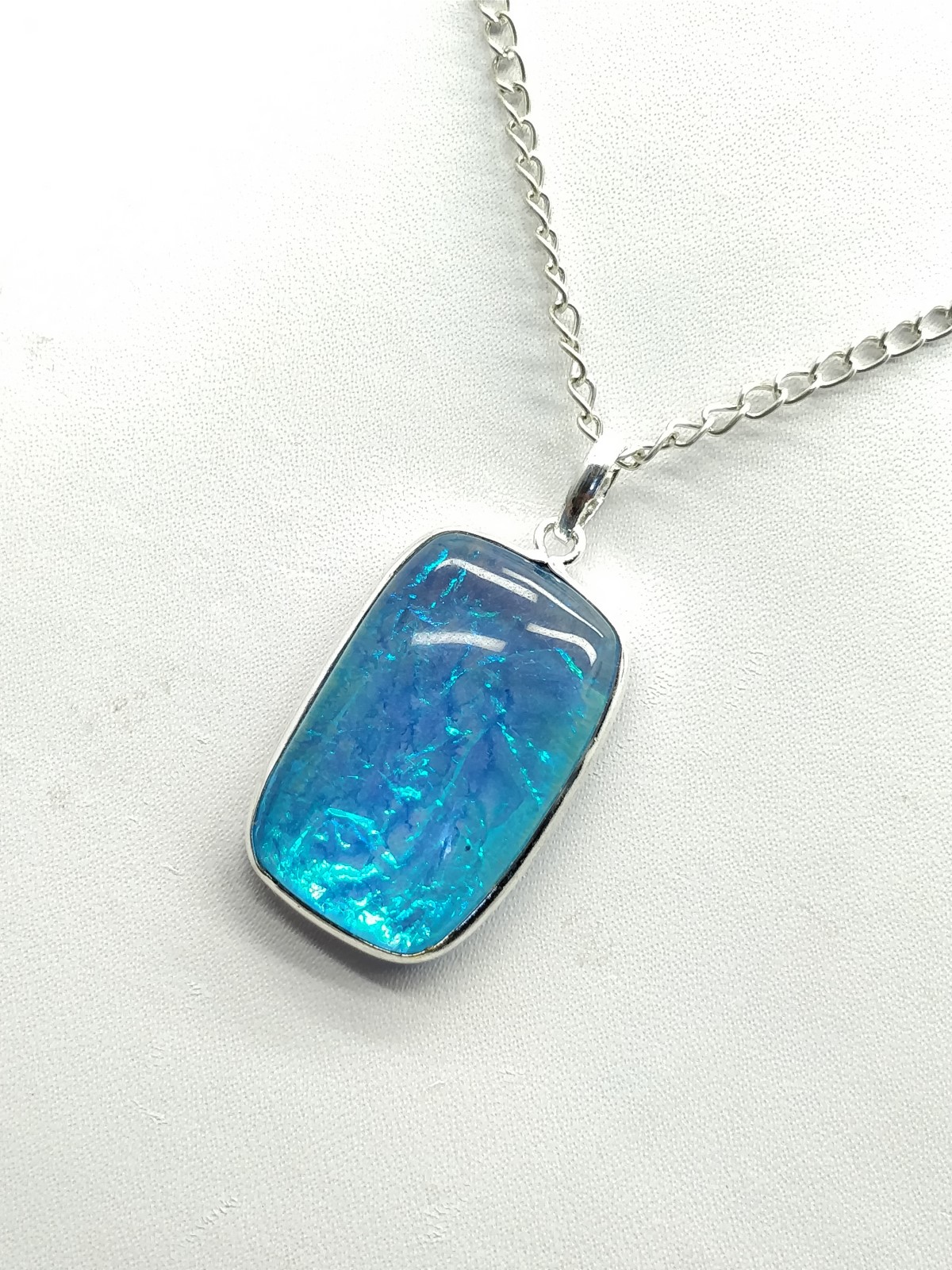 Sky Blue Fire Opal Pendant 40x20x8 mm, Rectangle & Smooth wt. in 41 Ct